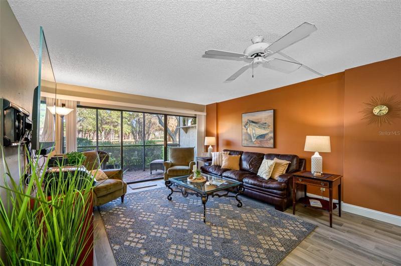 Spacious living area, with view of the golf course, creates a park-like setting.