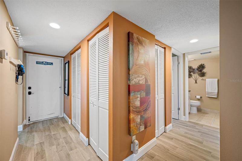2nd Bath is located   off foyer hallway, nearby to 2nd bedroom.