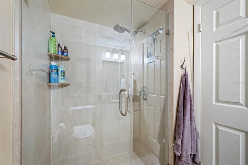 2nd Bathroom with walk-in shower, frameless shower door.