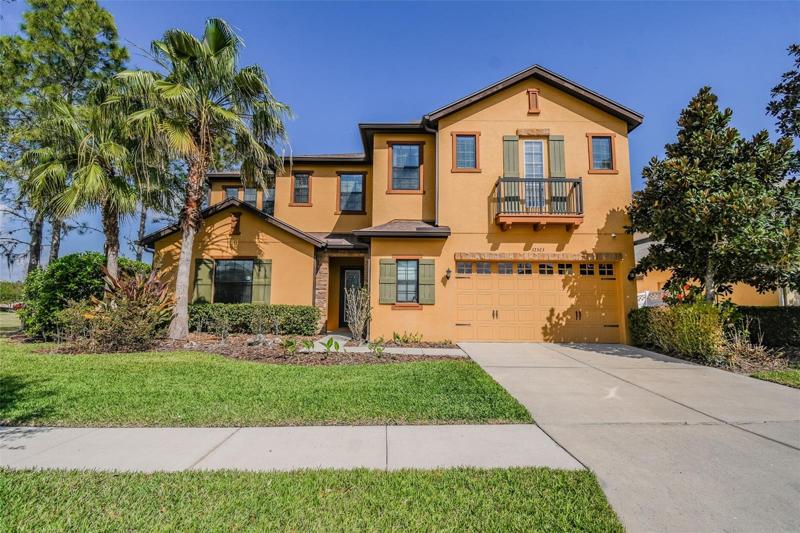 5 bedroom, 4 1/2 bath home with bonus room, loft area, covered and screened lanai plus a large fenced yard!