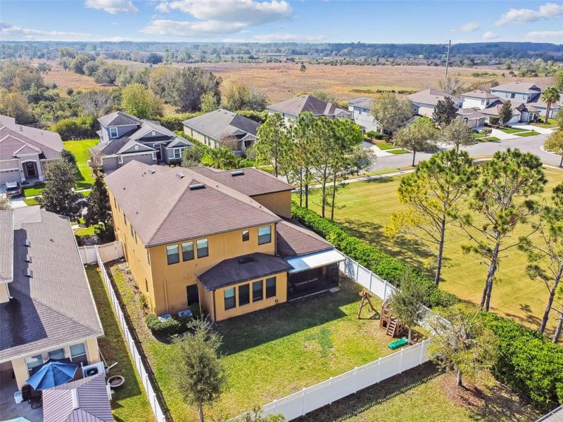 The fenced yard offers privacy from neighbors. Notice the passive park next to the home....no neighbors on that one side!