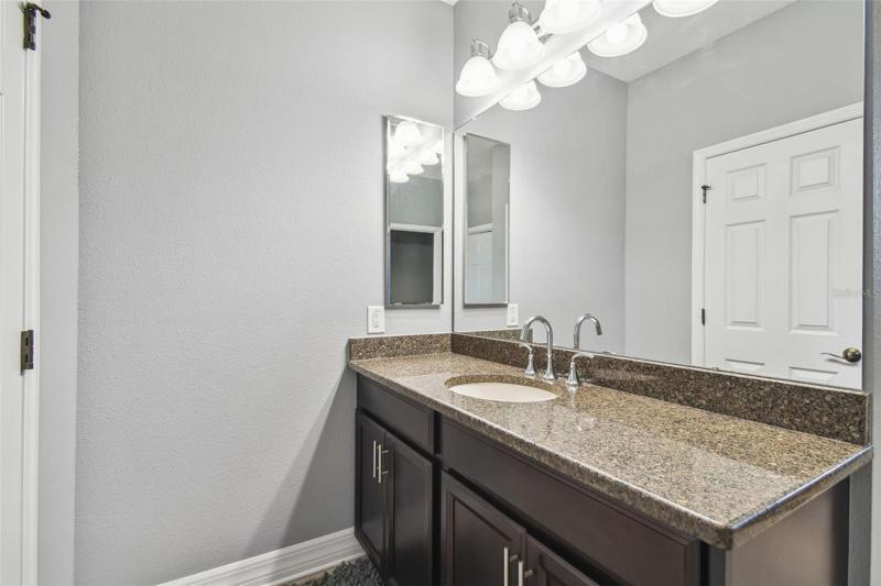one of the two separate vanities in the master bath.