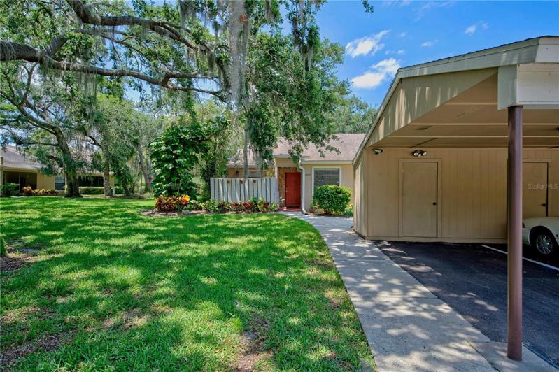 Entryway with Carport and stroage.