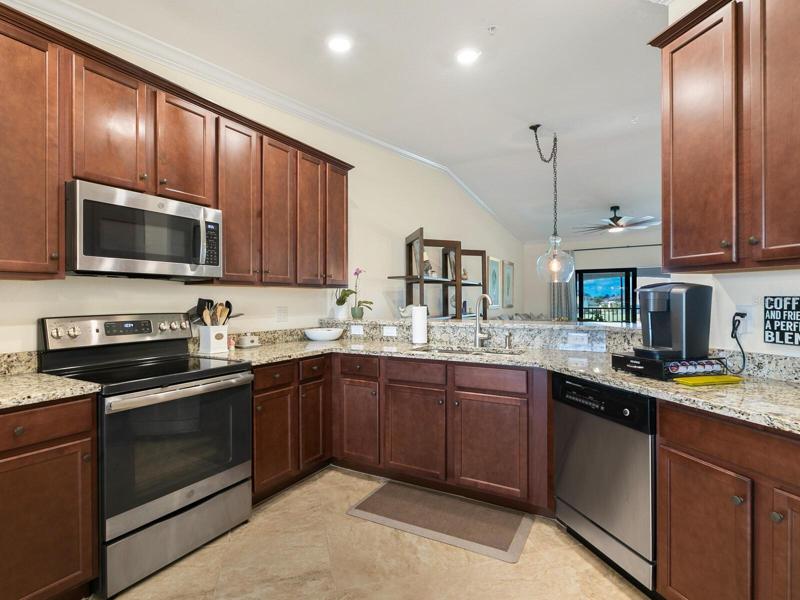 Spacoius Kitchen with views of Golf cousre and open to dinning and living area