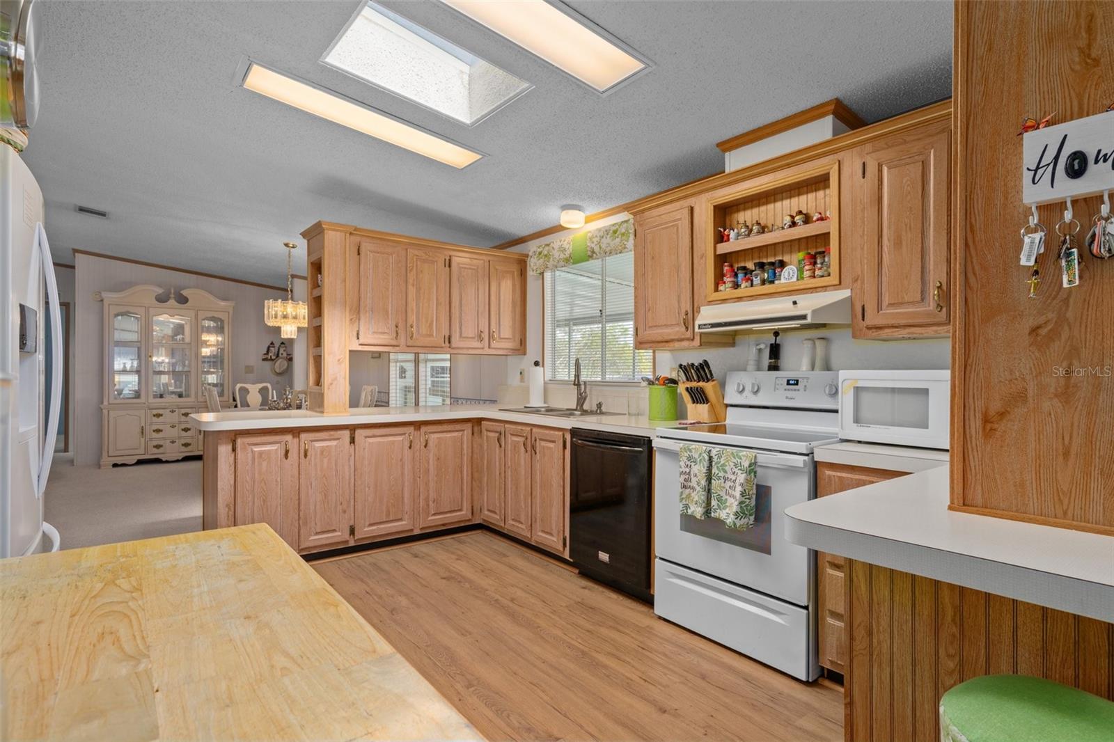 Breakfast nook and kitchen.  Enjoy sharing time with family and friends.