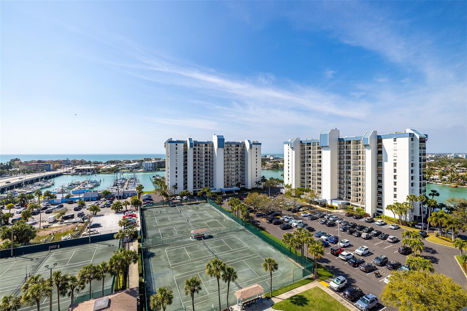 Tennis courts and Gulf in the distance