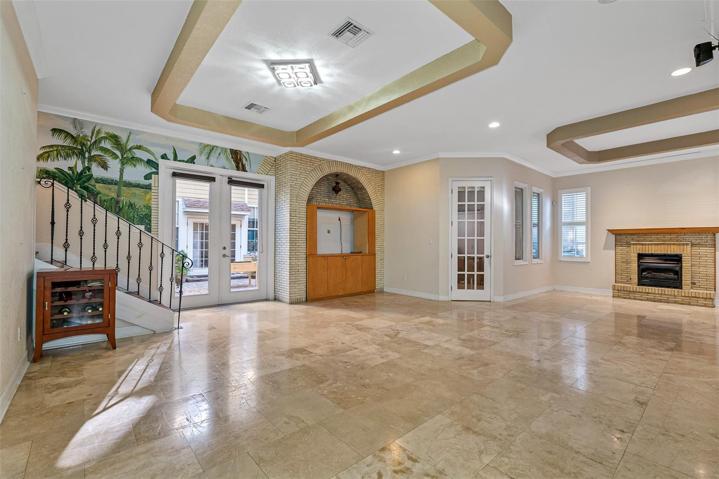 French Door open to Backyard