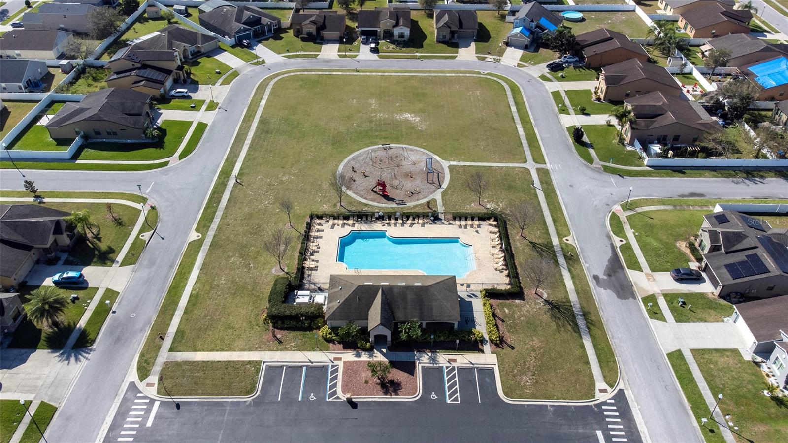 Community Pool and one of the community's playgground