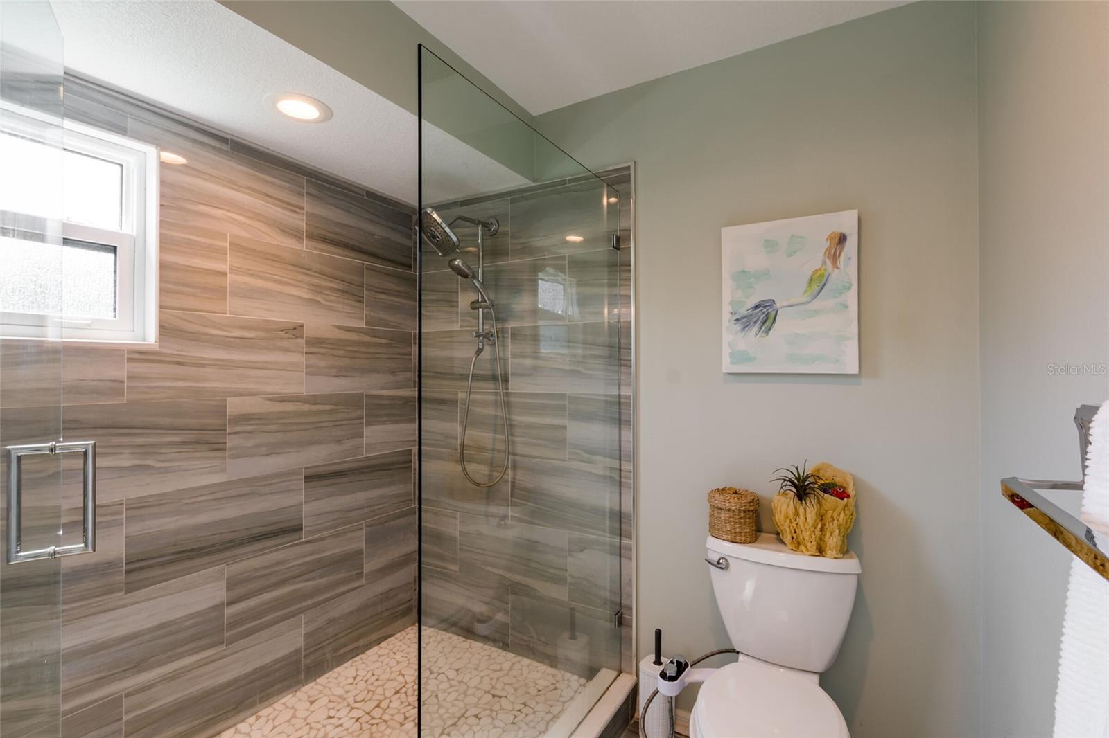 Master shower and water room.