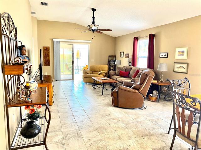 BEAUTIFUL TILE FLOORING THROUGHOUT THIS OPEN FLOOR PLAN