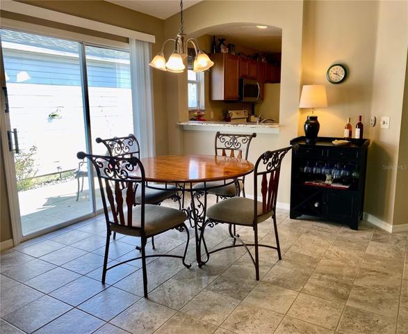 DINING AREA WITH PASS-THROUGH INTO THE KITCHEN