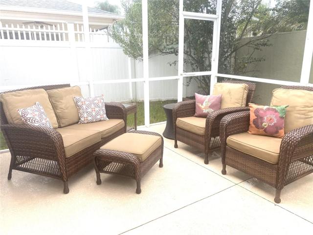 PATIO AND BIRDCAGE RIGHT OUTSIDE THE LANAI