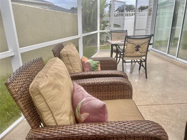 PRIVACY FENCING MAKE THIS OUTDOOR BIRDCAGE AND PATIO A GREAT SPACE TO ENJOY