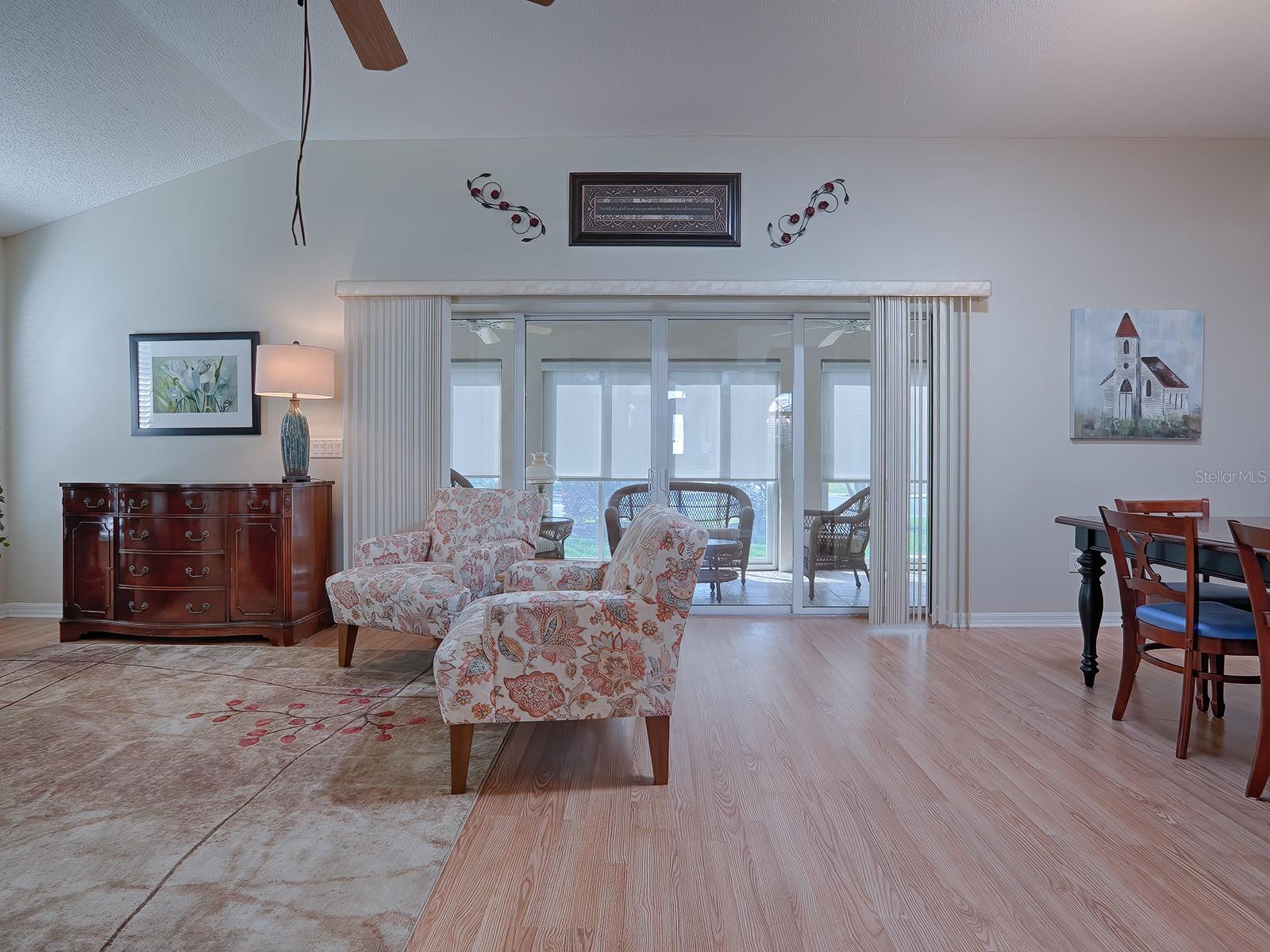 DIRECT VIEW INTO THE LANAI FROM THE HEART OF THIS HOME