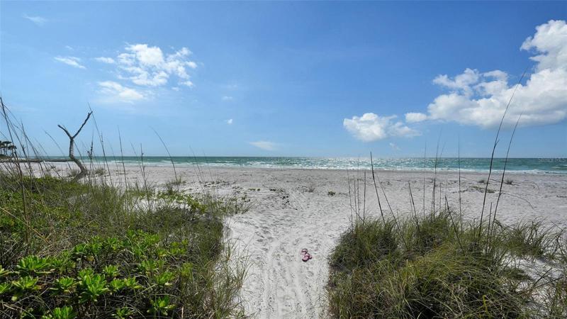 Directly to the South, 4 parcels down is the Ohana house, with a seawall that juts out into the Gulf, so no passerby's coming up from the South to your beach