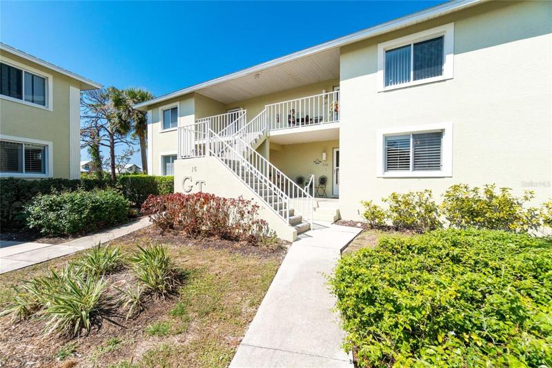 Front entry to Unit #110 located on the first floor. 