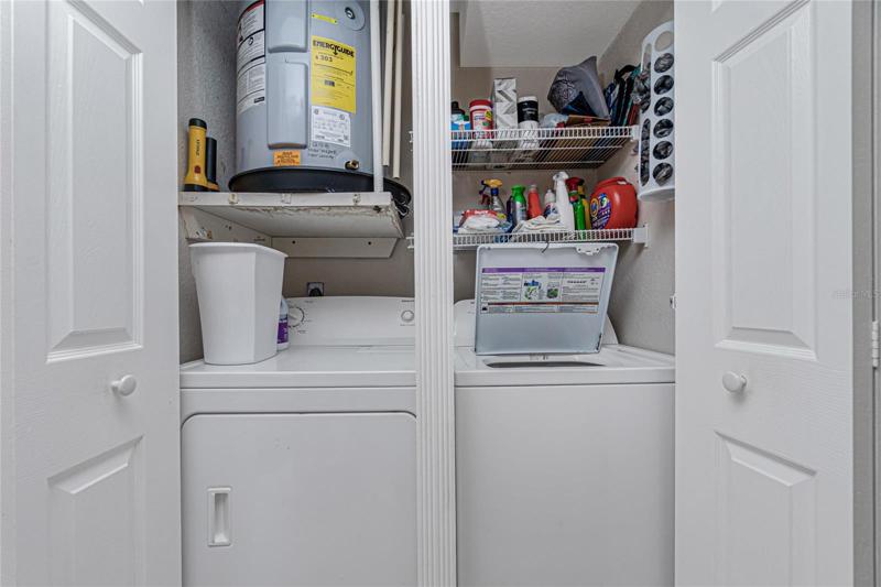 The laundry closet features an Admiral washer and dryer.
