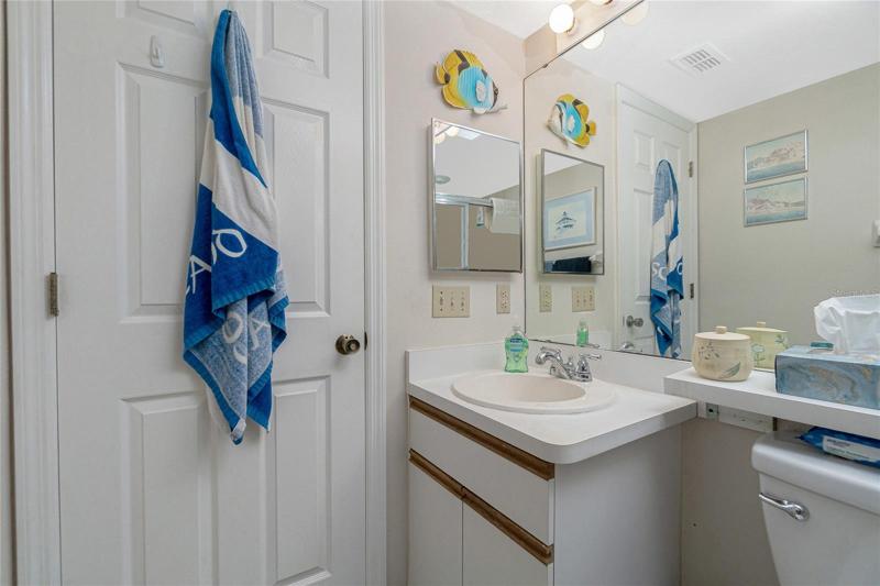 The vanity in the guest bathroom has a newer faucet.