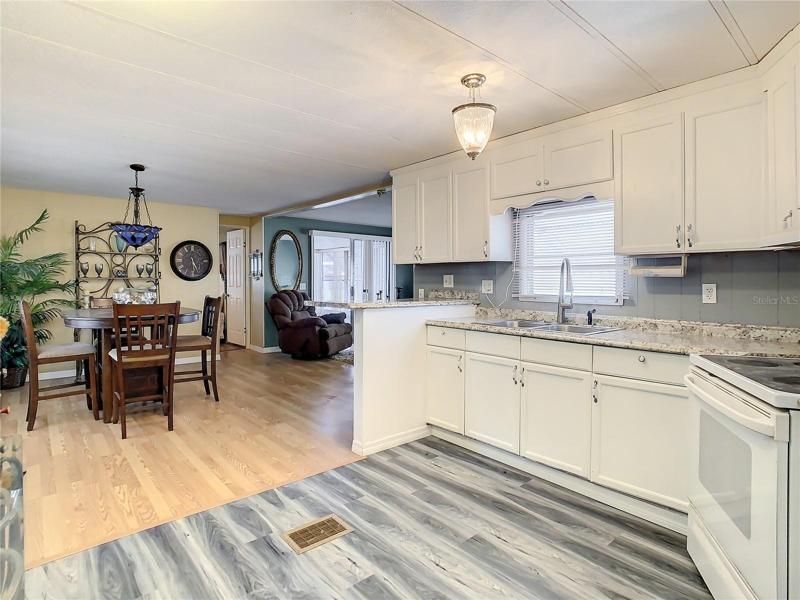 kitchen open to dining room and living room
