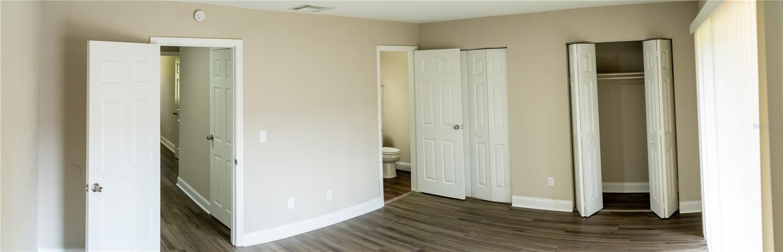 Master bedroom with ensuite bathroom and his and hers closet