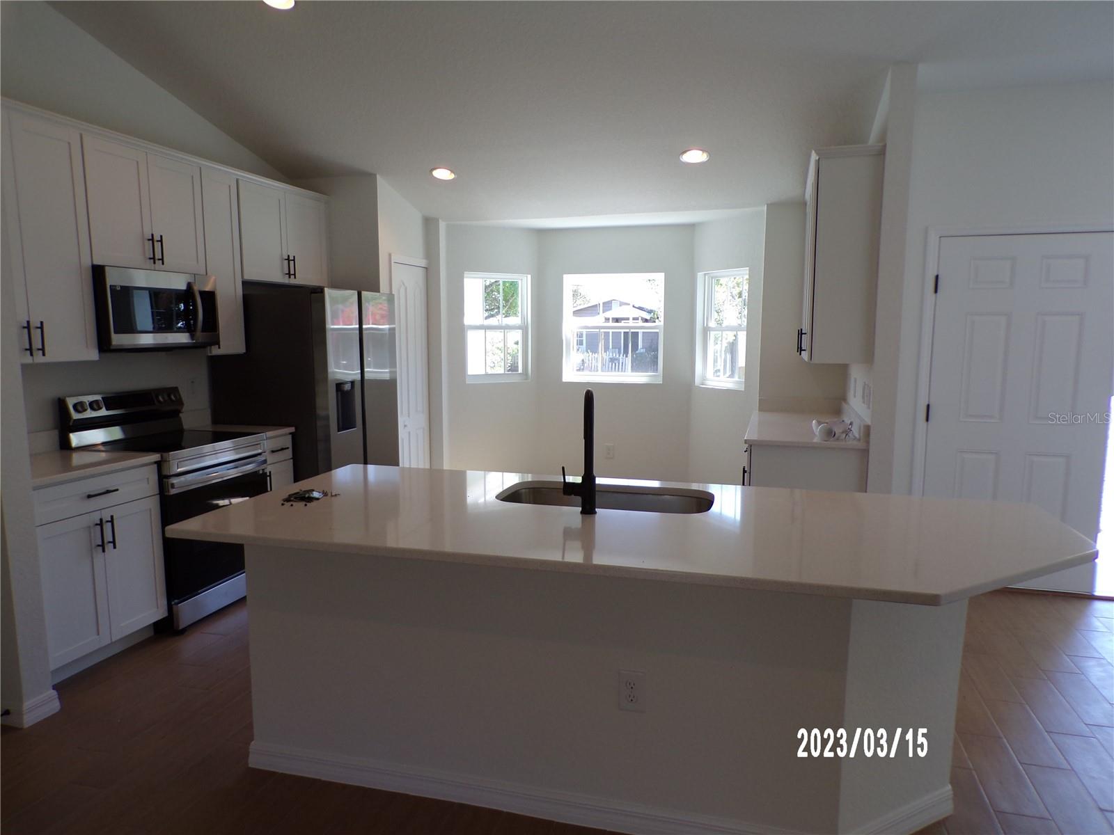 White cabinets with quartz counter tops