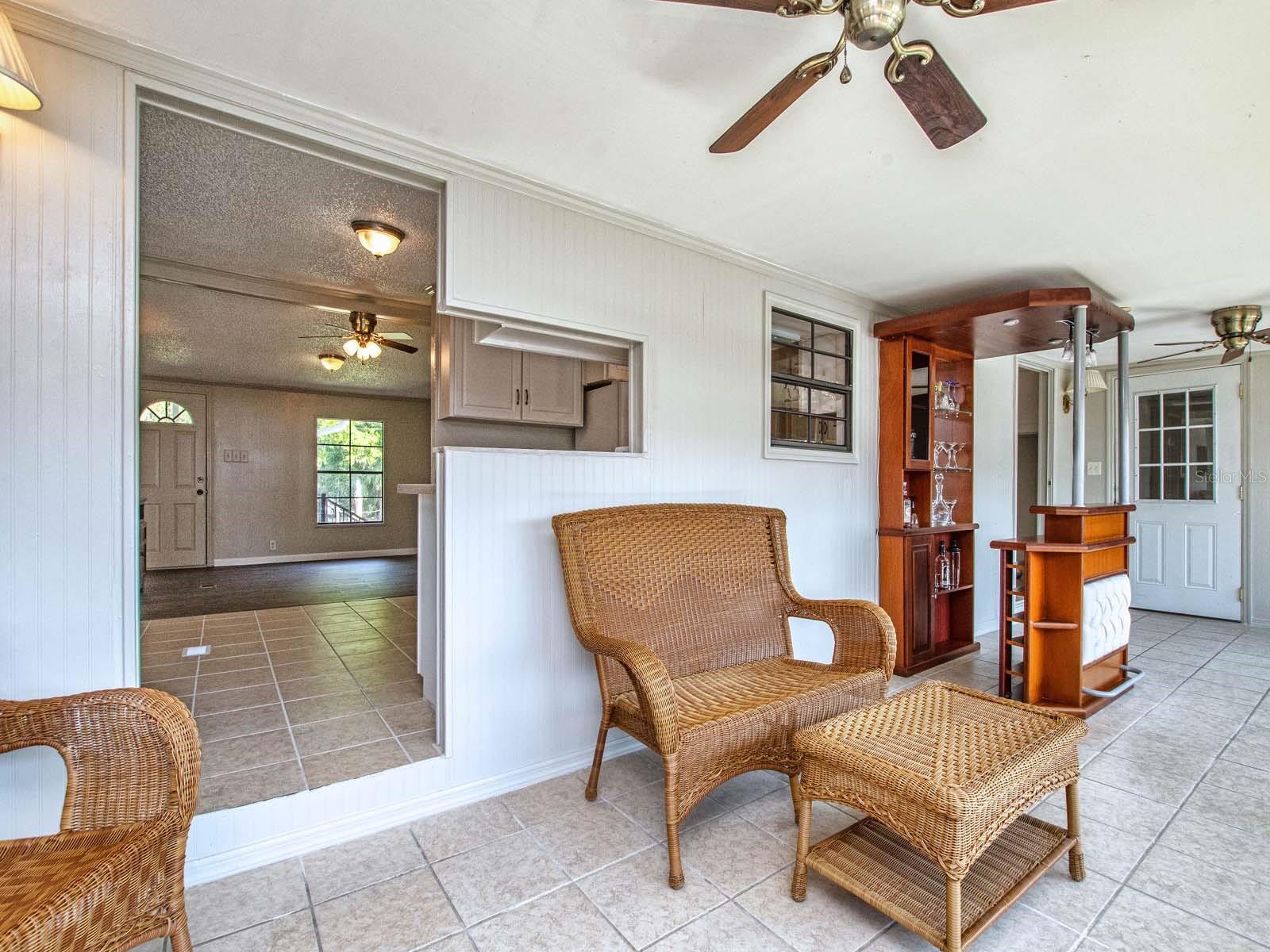 Large enclosed porch with water view