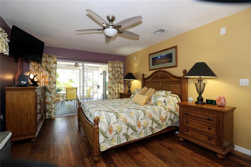 Primary bedroom has 8 foot sliding door to the lanai. 