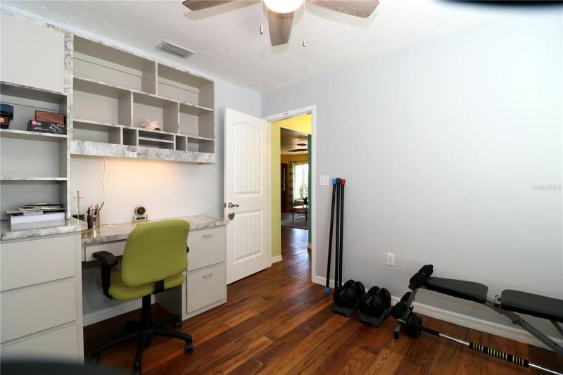 Bedroom 3 has built-in desk and storage.