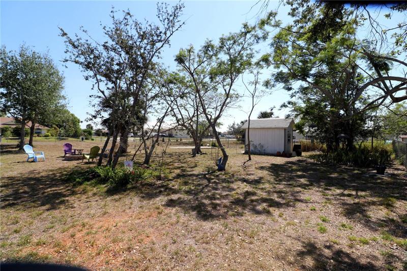 Additional lot has concrete apron allowing easy access to RV/Boat Parking.
