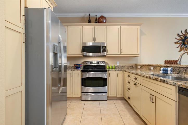 Large kitchen with stainless appliances