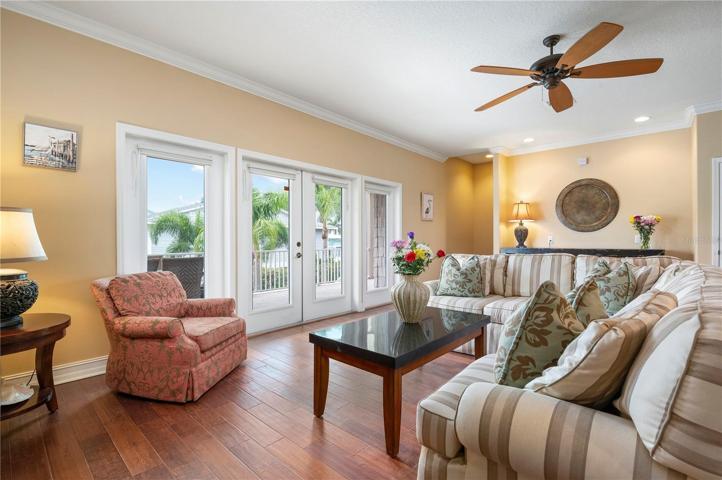 Living area with doors to the covered patio/outdoor dining