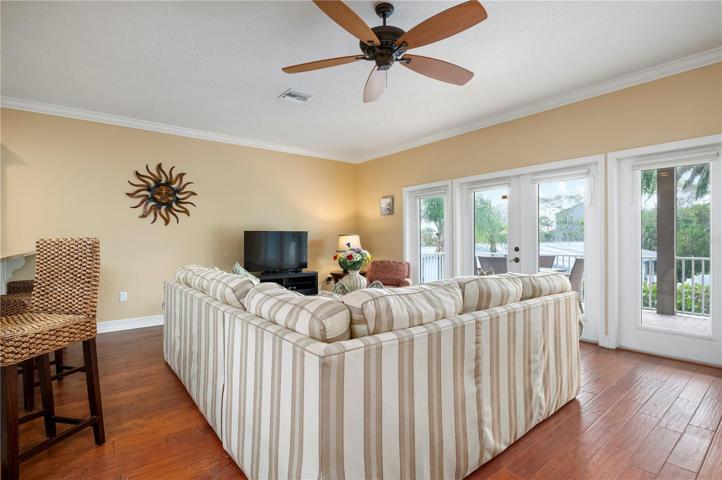 Living room with doors to the 28 x 11 patio