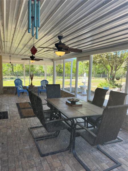 Screened porch on front of home