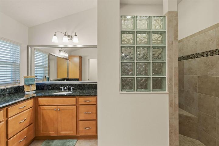 Master Bath with walk-in Roman Tile Shower