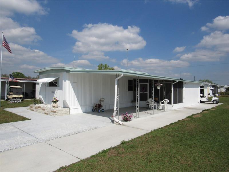 Expanded driveway/cart path.
