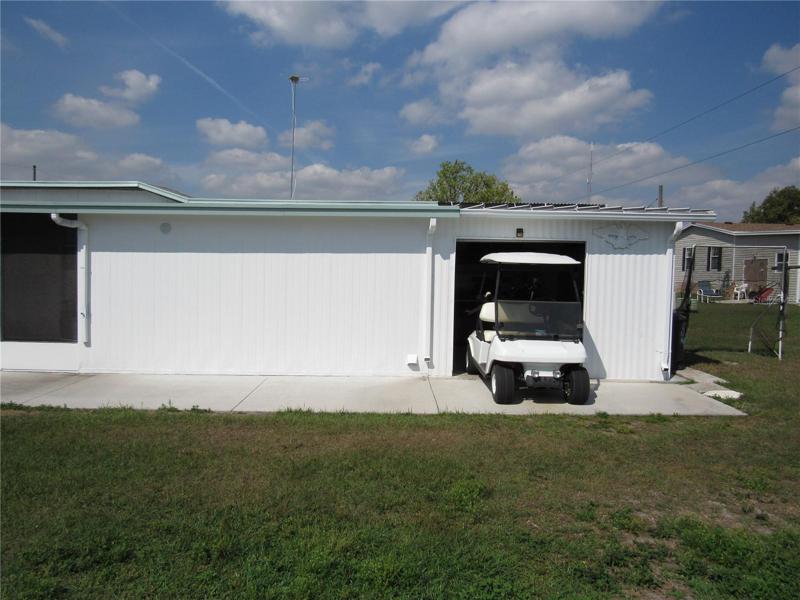 Attached golf cart garage.