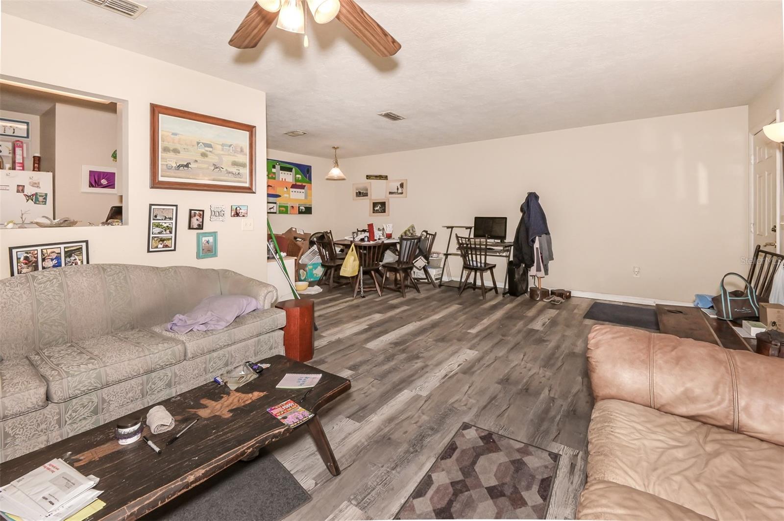 Unit #1222 Large Open Living Room To Dining Area