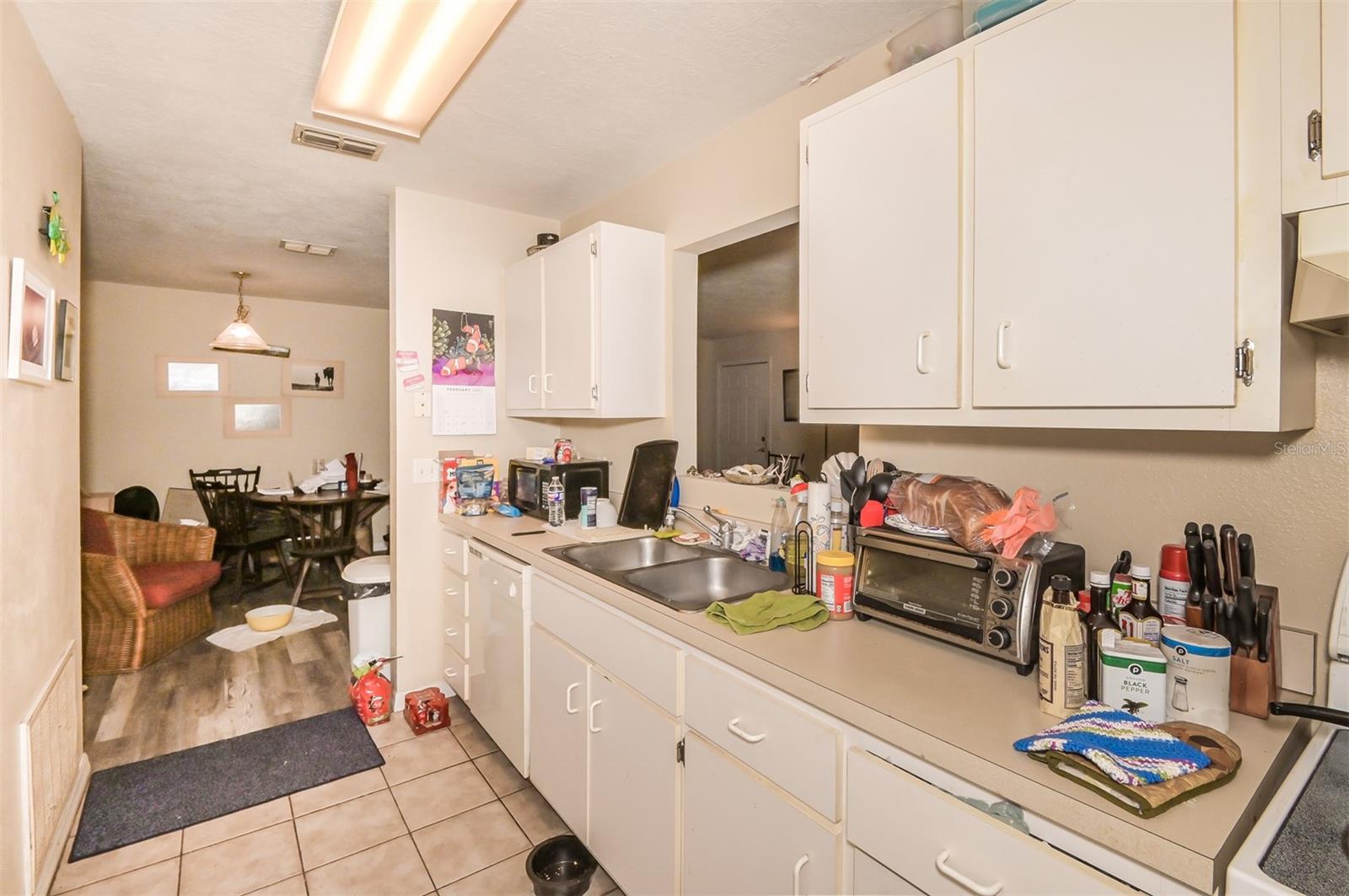 Unit #1222 Galley Kitchen To Dining Area