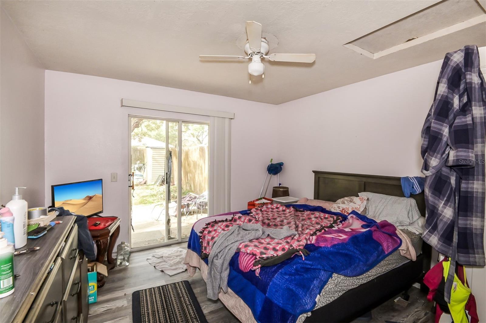 Unit #1222 Master Bedroom With Access To Backyard
