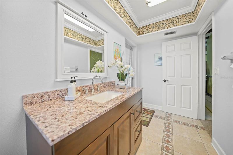 Guest bath with exit to Pool