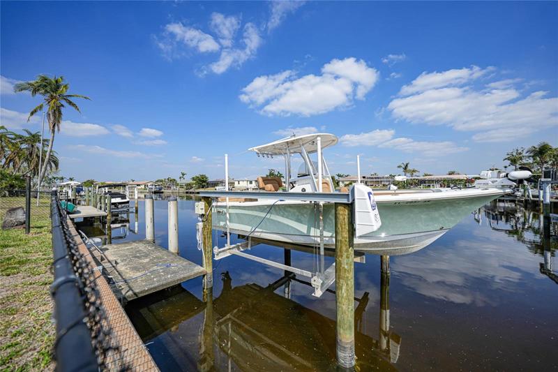 Dock/Lift.  Boat for sale outside of contract.