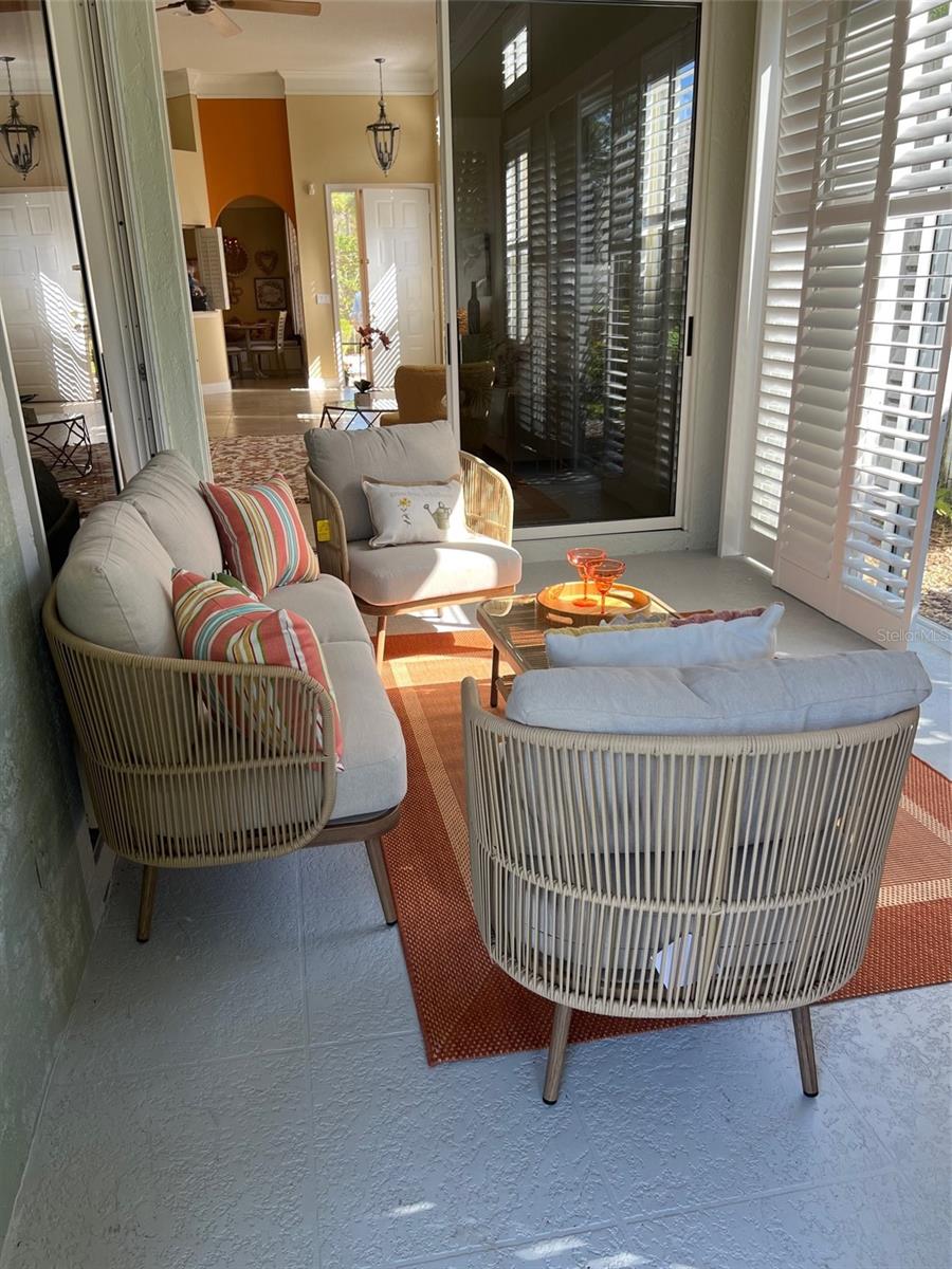 Florida room with plantation shutters