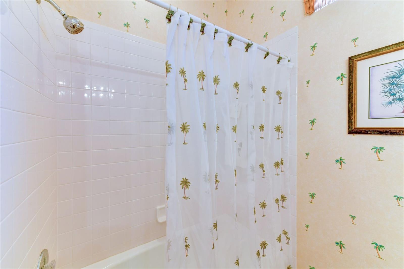 Guest bathroom with a tub