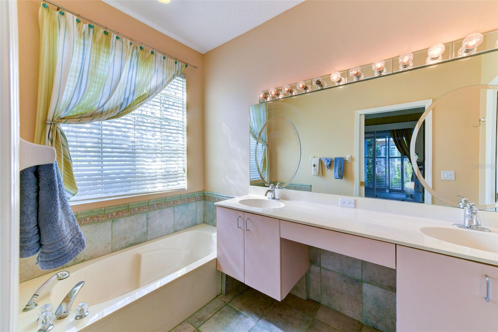 Main bathroom with a garden tub