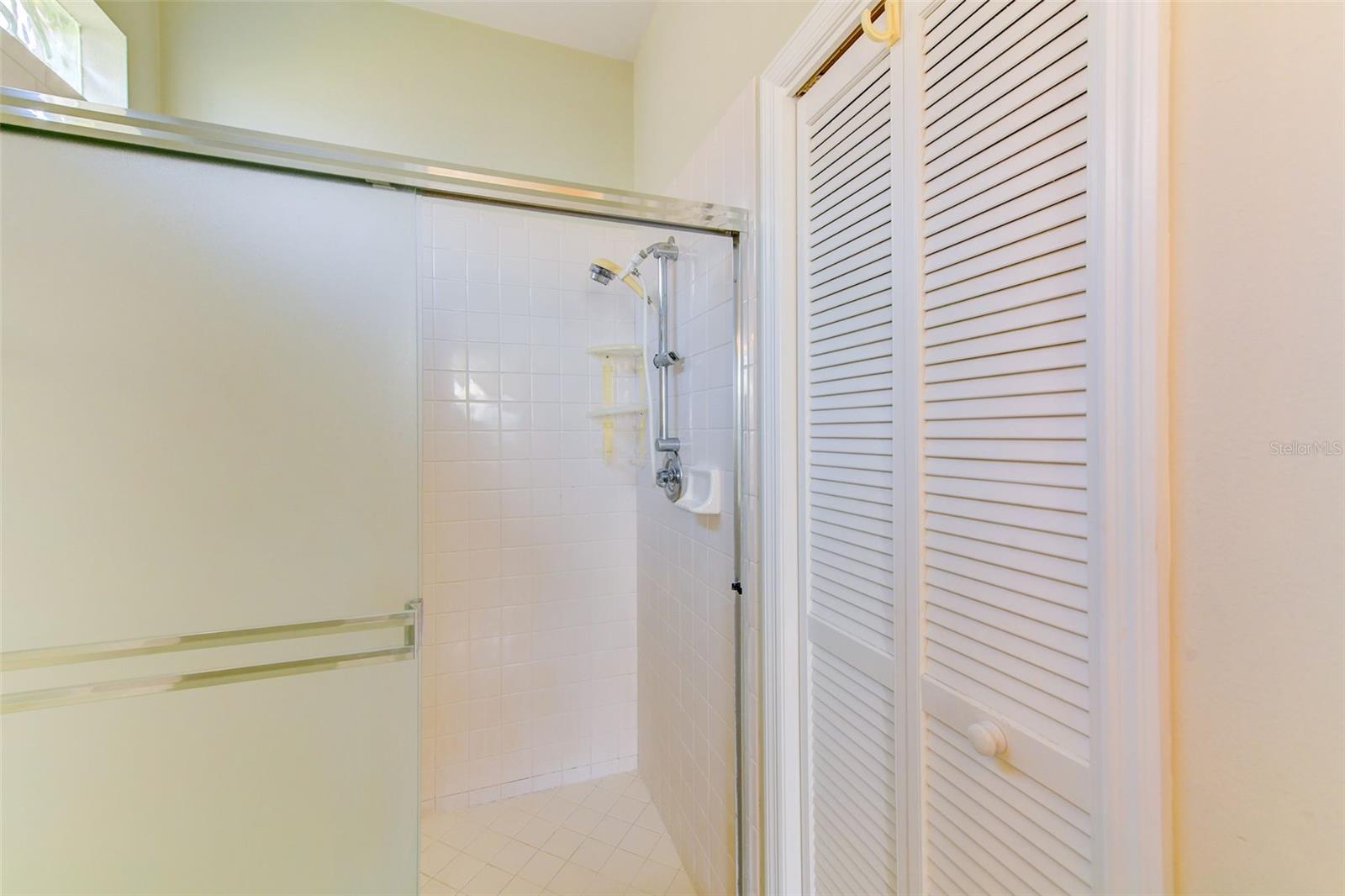 Main bathroom with a walk-in shower