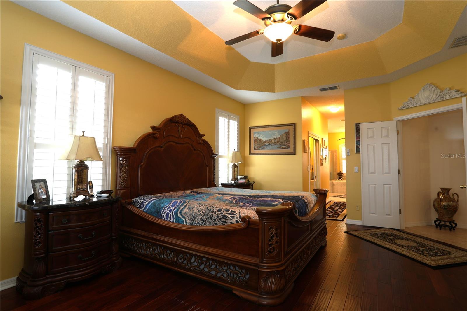 Large master bedroom with trey ceiling