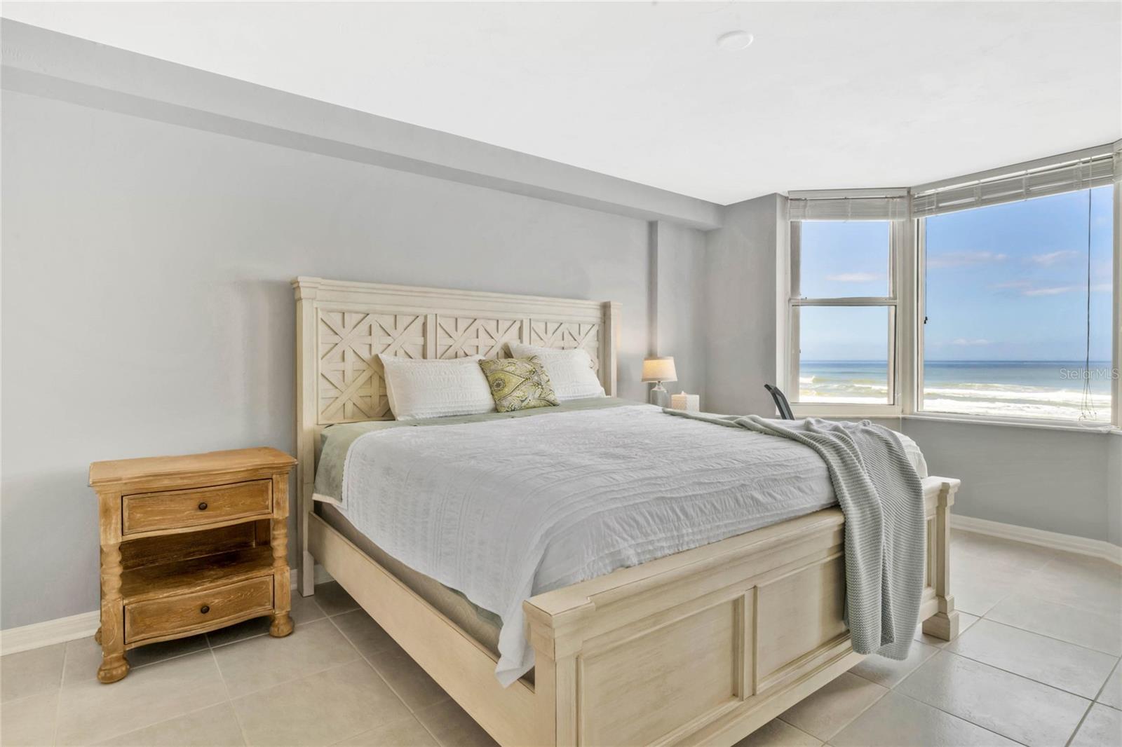 Spacious primary suite with an amazing view.