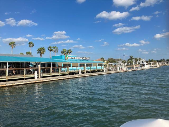 One of the tasty local restaurants, Off the Hook Raw Bar and Grill offers street parking and marina docking.