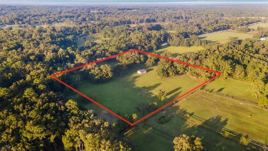 AERIAL VIEW SHOWING PROPERTY LINES
