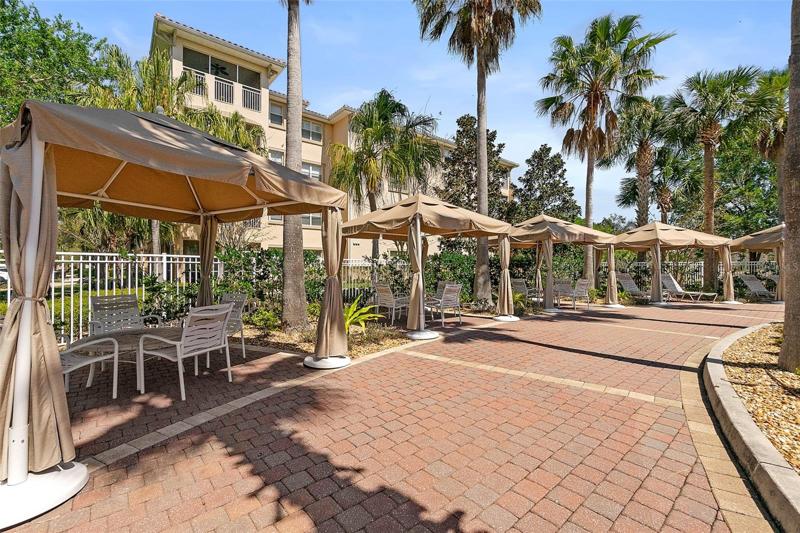 cabanas at pool just steps from your doorway